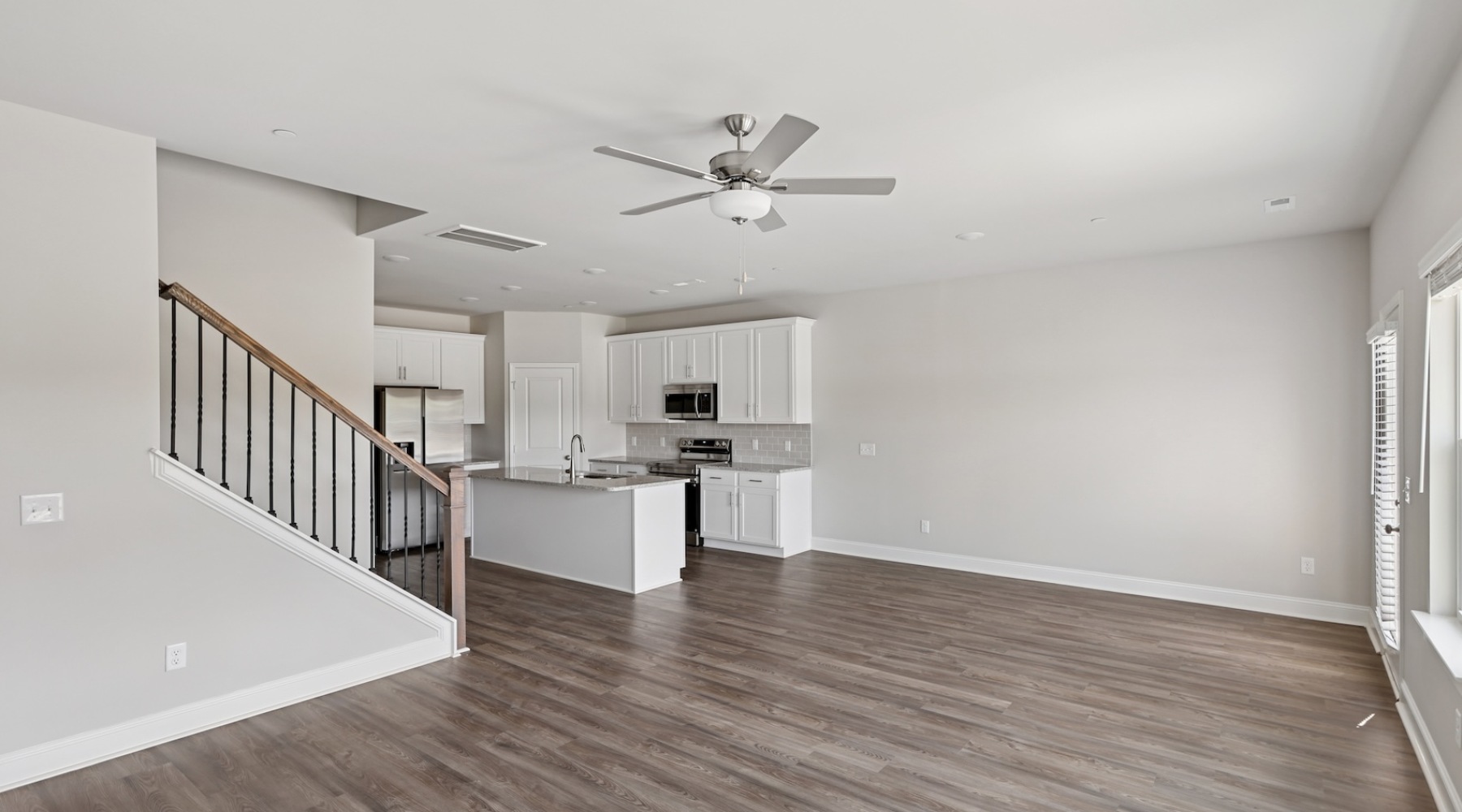 Open space living area with natural lighting