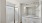 walk-in shower and sink with mirror in a bathroom